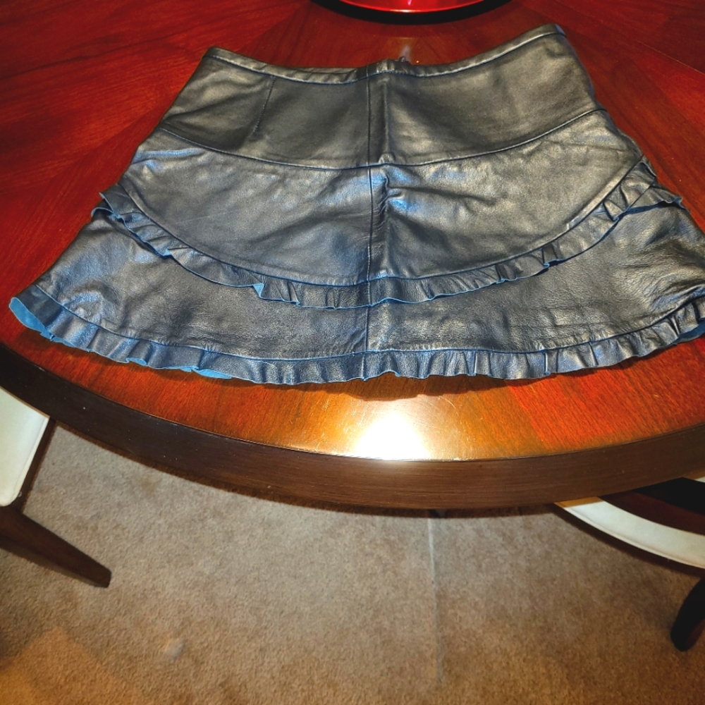 BLK LEATHER MINI SKIRT by BCBG